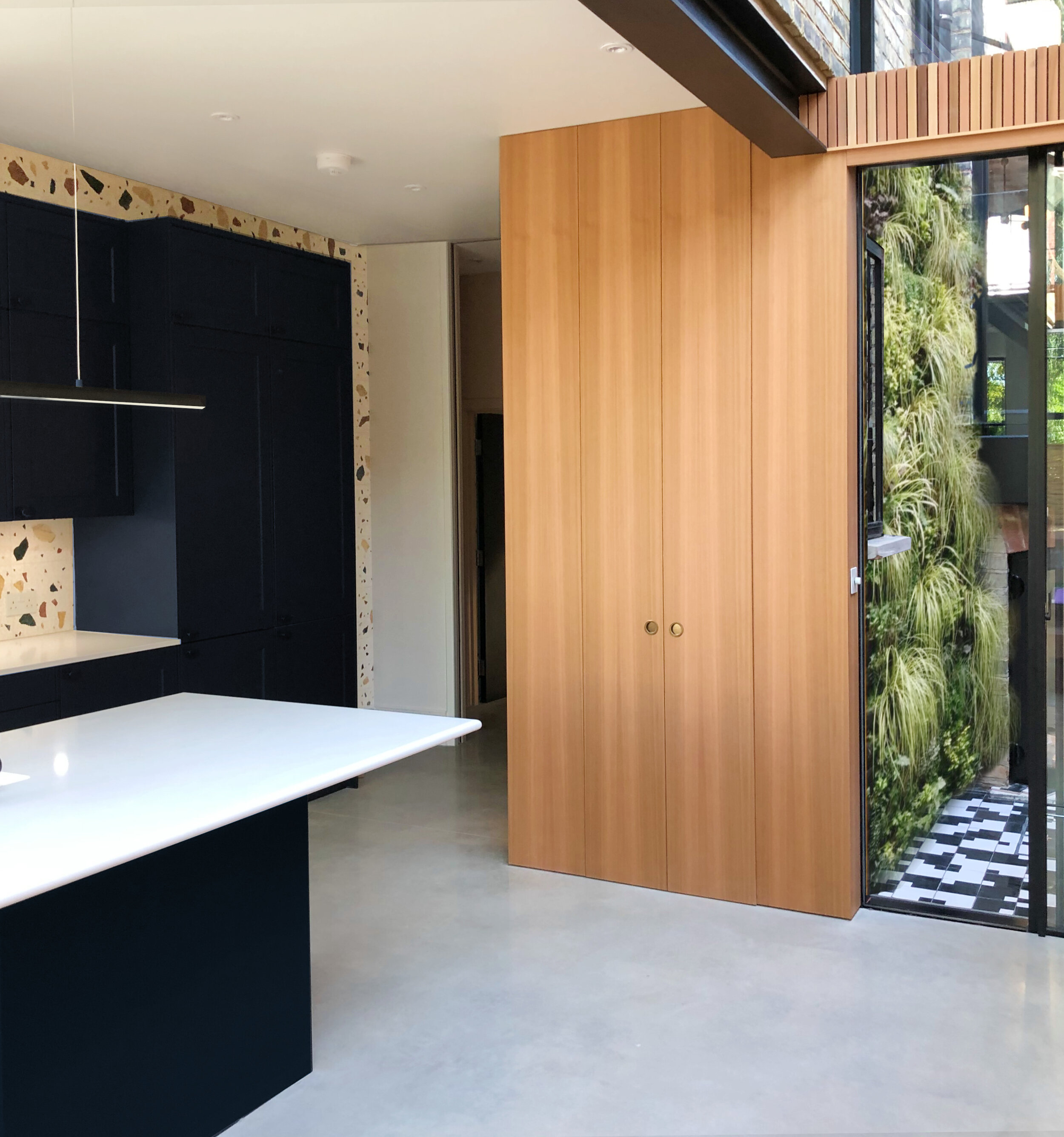 internal courtyard kitchen with exposed steel beam in conservation area